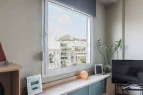 Homz AH07 Top floor 2-bedroom flat near Kallimarmaro